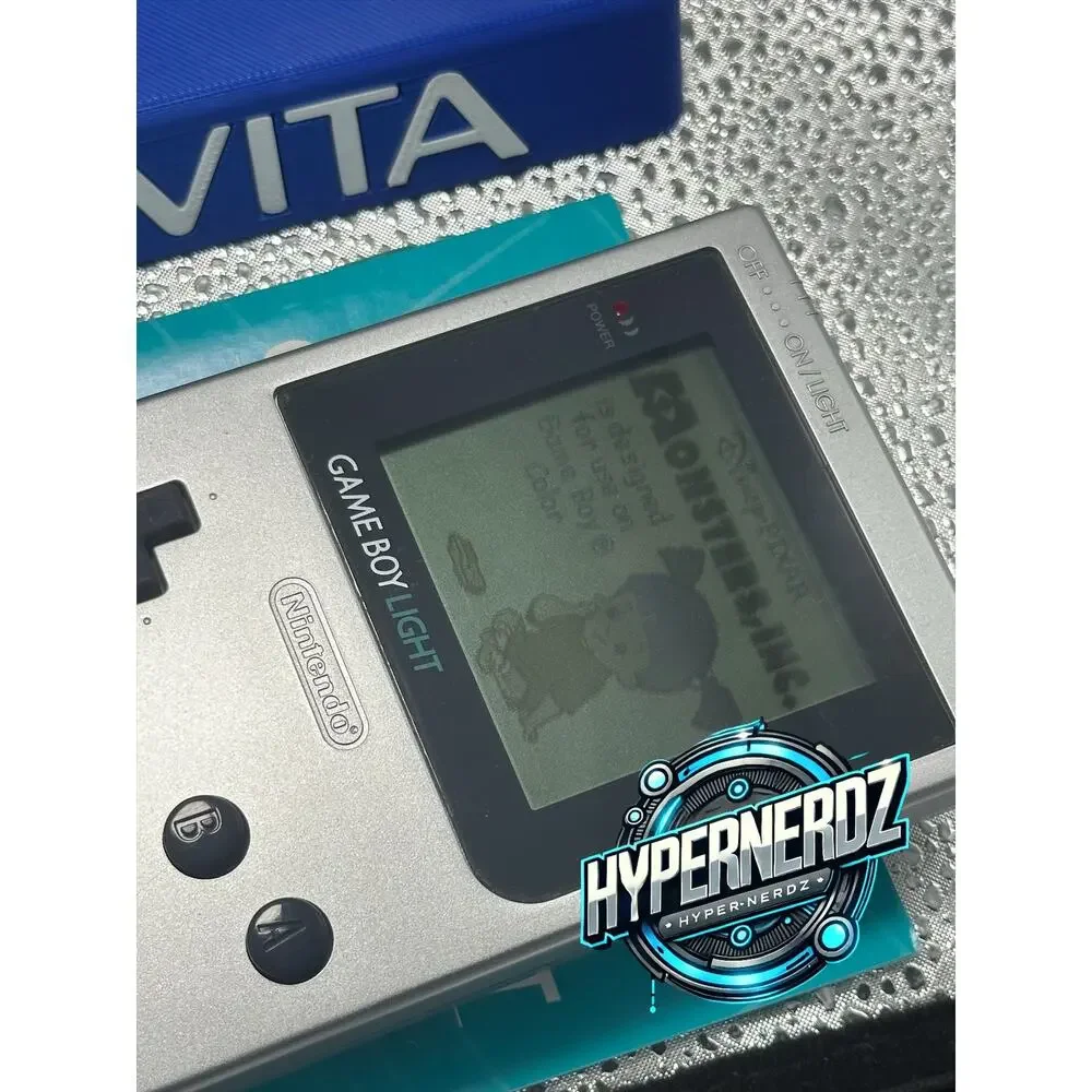 Sliver gameboy light in box! Amazing condition!